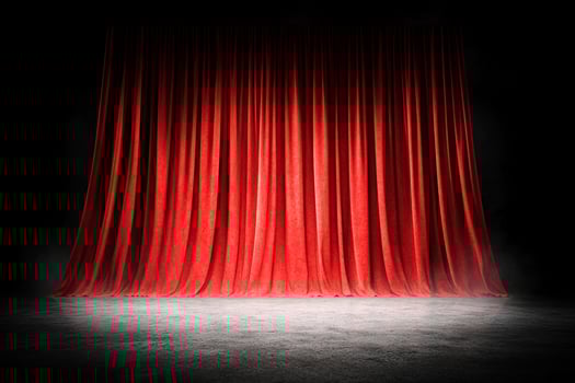Red curtain on stage with spotlight photo