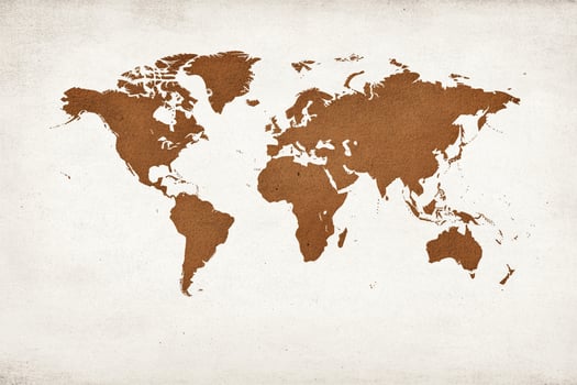 A brown world map on a white background photo