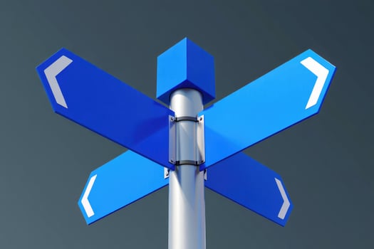 A blue signpost with arrows showing different directions against a gray background. photo