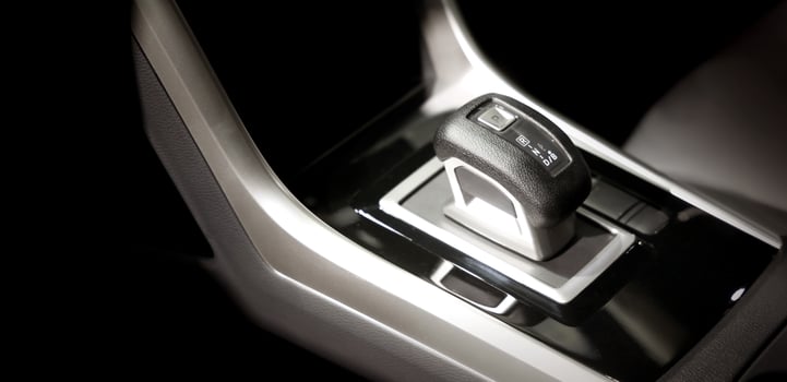 EV Car gear. Close up of modern automatic car gear shifters in luxury vehicle interiors. Feature sleek ergonomic designs and advanced car transmission controls for premium driving experience. EV gear. photo