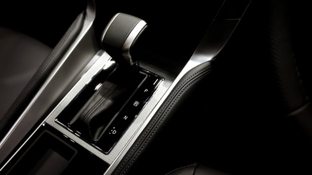EV Car gear. Close up of modern automatic car gear shifters in luxury vehicle interiors. Feature sleek ergonomic designs and advanced car transmission controls for premium driving experience, EV gear photo