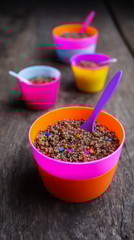 Colorful Quinoa Bowls with Sprinkles for Kids Breakfast or Snack. photo