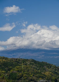landscape captures the peaceful coexistence of urban life and nature in rural Japan. In the distance, the iconic Mount Fuji rises majestically, Japan photo