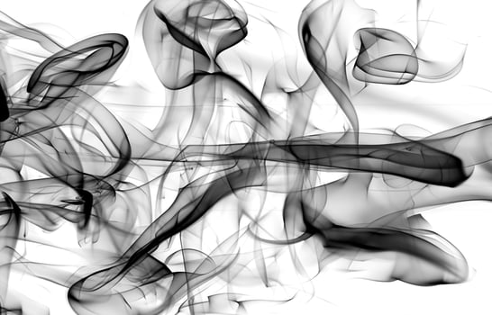 Abstract Black Smoke Swirls on White Background photo