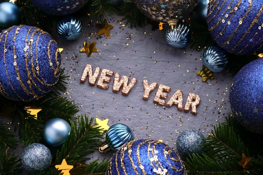 Abstract New Year blue background with Christmas decorations. photo