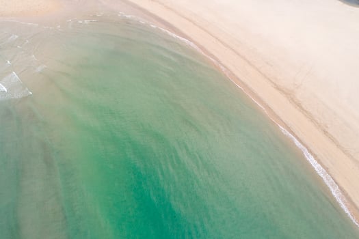 The Shoreline of a Tropical Beach from a High Angle photo