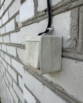 old white street light switch photo