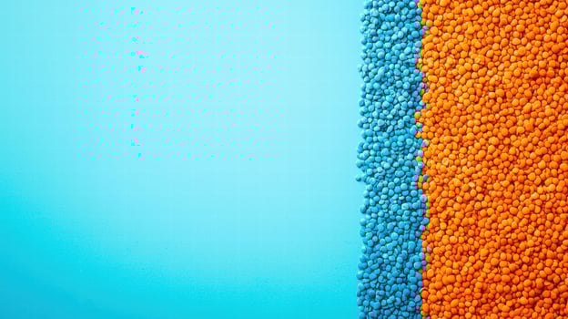 Vibrant blue and orange textured background with colorful beads photo