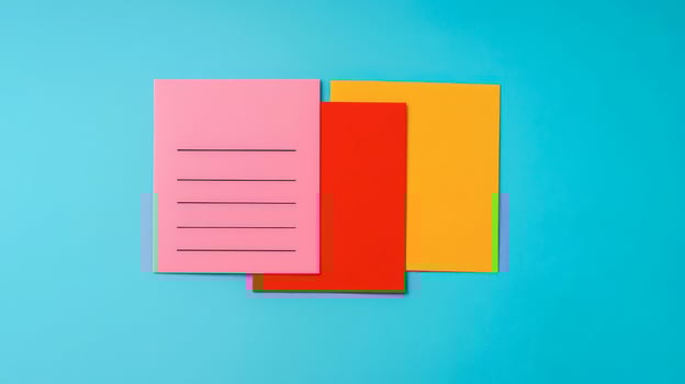 Colorful sticky notes on a blue background, great for organization or reminders photo