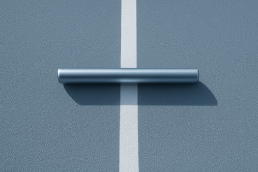 Metal relay baton on white line of blue grey running track. photo