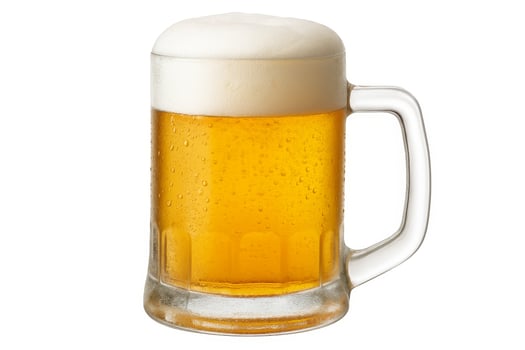 Cold beer in glass mug with foam on top, isolated on white background, refreshing drink. photo