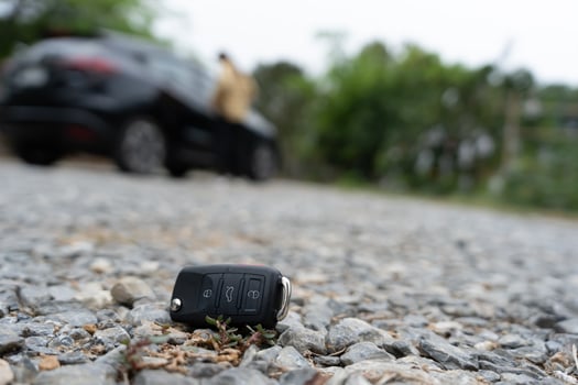 Lost car keys on the ground. Car keys dropped on the floor or fall lying on the street home front. Walking Away From Lost Car Key, can not transport, express, rush time, wast time, emergency photo