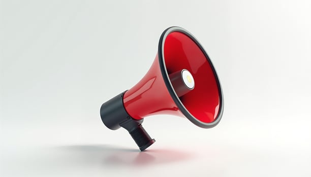 A red megaphone with a black handle. photo