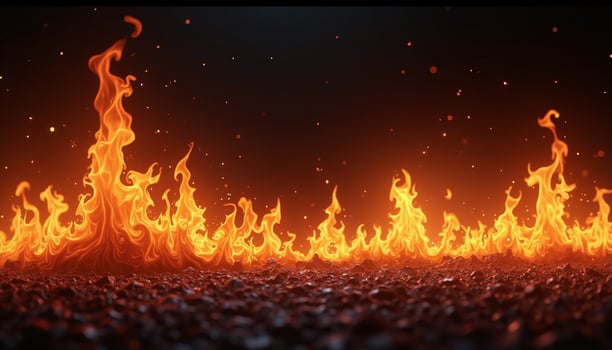 Flaming fire upon rocky terrain. photo