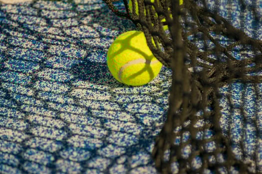 A Sports Background with a Padel Ball and Shadow. Concept A dynamic image for sports content. photo