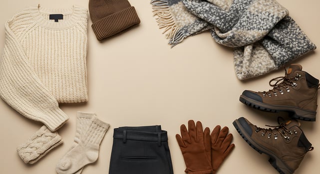 Warm Winter Clothing Set with Sweater Scarf Gloves Boots and Pants in Neutral Colors photo