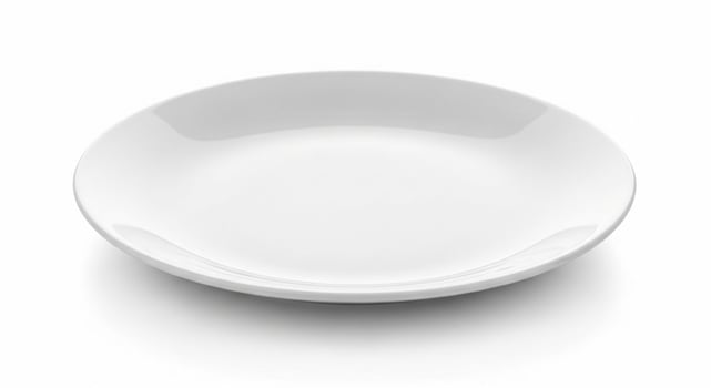 White Ceramic Plate Isolated on White Background. photo