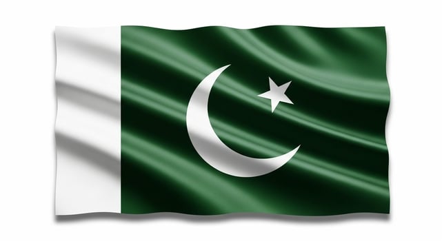 Pakistan Flag Waving Green and White National Symbol. photo