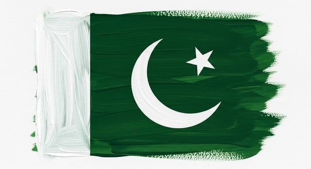 Pakistan Flag Painted with Brush Strokes Green White Crescent and Star. photo