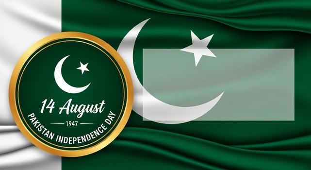 Pakistan Independence Day 14 August 1947 Emblem on Waving Flag. photo