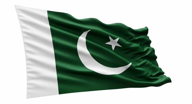 The national flag of Pakistan waving with realistic fabric texture on a white background. photo