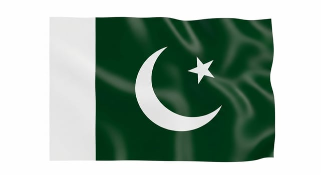 Waving National Flag of Pakistan with Green and White Colors. photo