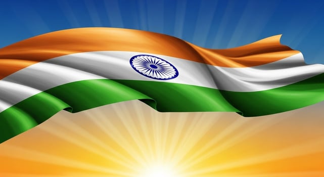 Indian Flag Waving at Sunrise, Saffron, White, Green Stripes, Ashoka Chakra photo