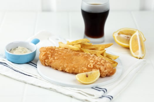 Fish and Chips Crispy Battered Fish Served with Deep Fried Potato photo