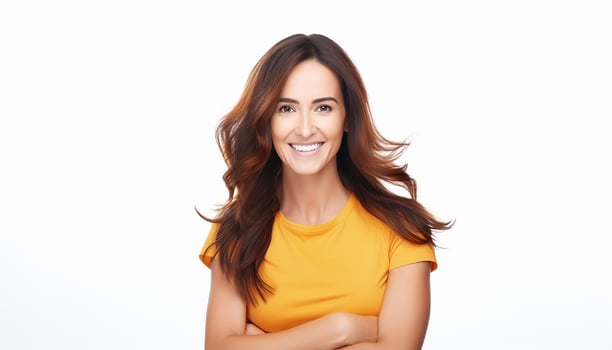A woman in a yellow shirt is smiling photo