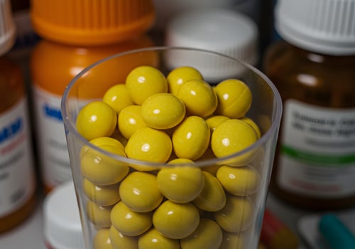 A glass of pills photo