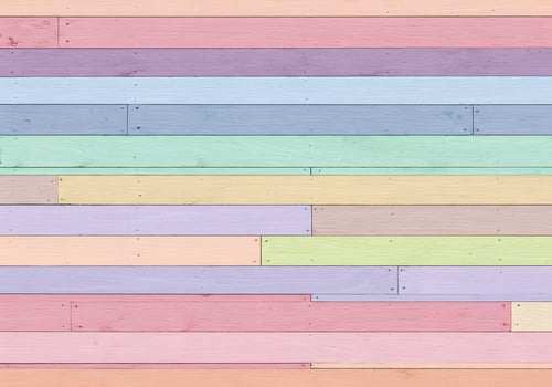 A colorful wooden wall with many different colors photo
