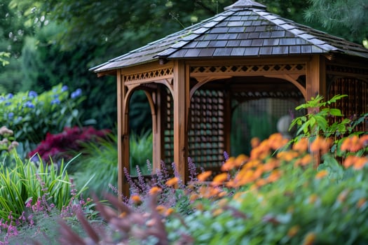 Wooden gazebo standing in a colorful garden during summer photo