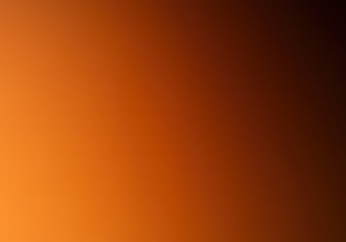 A smooth gradient of warm orange to dark brown creates a vibrant background photo