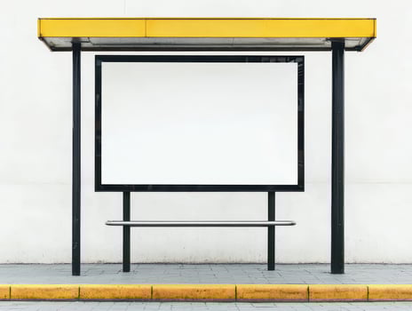 Bus stop shelter with a blank advertisement space, white isolated background. photo