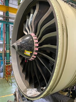Detailed view of high bypass turbofan jet engine under repair photo