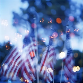 Soft Focus America flags with bokeh lights create a patriotic mood. photo