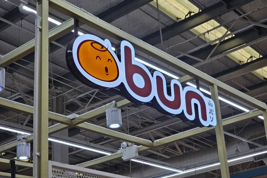 Bangkok, Thailand May 13, 2025 Bun sign. It is a famous Mexican buns and croissant sticks in Thailand. photo