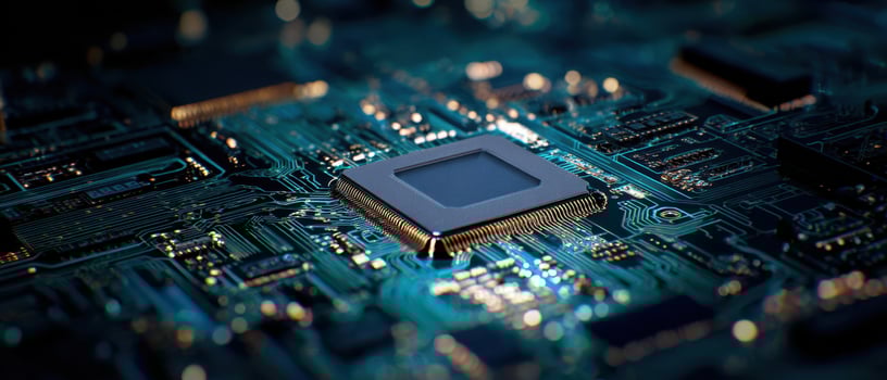 The intricate design of a microchip on a glowing circuit board. photo
