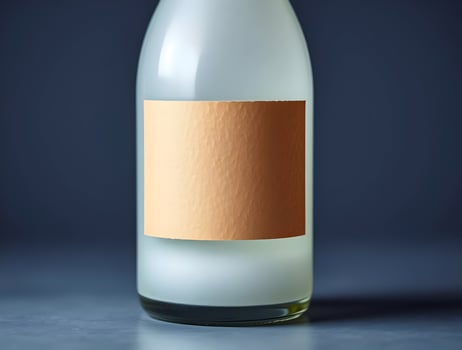 A bottle of white wine with a label on it photo