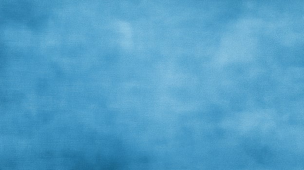 Soft blue textured background creating a calm and serene atmosphere for design projects and creative work photo