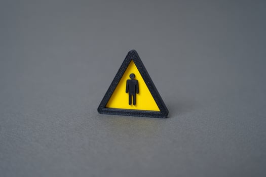 Warning sign with a person. Concept of searching for workers and new employees. Labor shortage issue. Skill gap. Urgent recruitment. Employment opportunity. photo