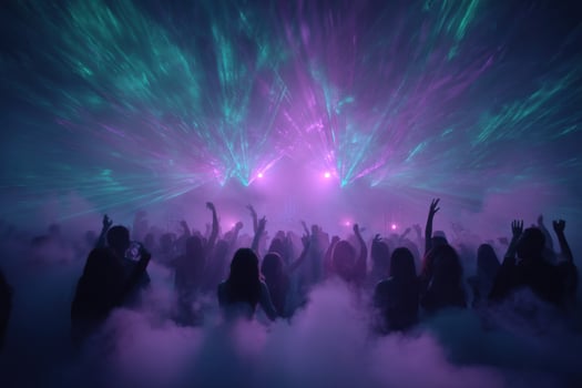 A crowd of people in the air with purple lights photo