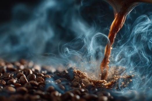 Coffee beans being poured into a cup photo