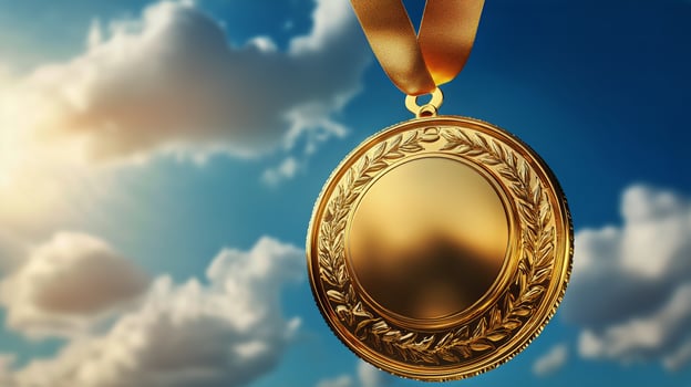 Golden Medal Hanging Against a Cloudy Sky During Late Afternoon Light, Symbolizing Achievement and Success. photo