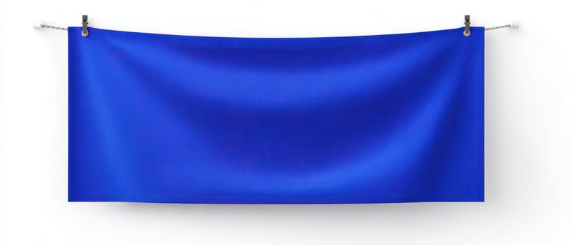The vibrant blue banner hanging against a clean white background. photo