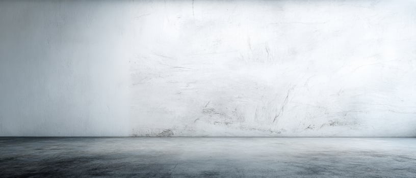 The minimalistic wall and floor in a spacious, empty room setting. photo