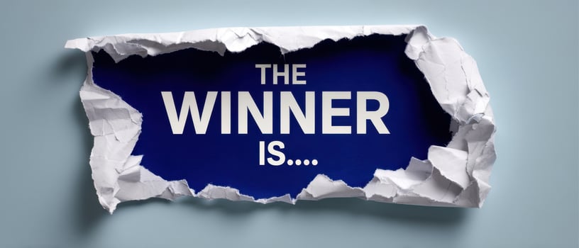 The Winner Is Revealed in a Dramatic Torn Paper Announcement. photo