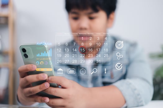 Mobile calendar login with futuristic holographic interface on smartphone, highlighting the 15th and representing time management, digital planning, and business productivity. photo