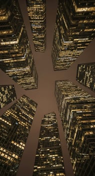 Worm's eye view of illuminated skyscrapers at night creating a modern urban landscape scene photo