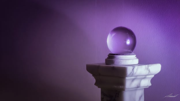 image of a crystal ball glows with mystical light photo